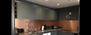 copper splashback in kitchen