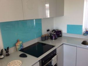 blue splashback behind hob