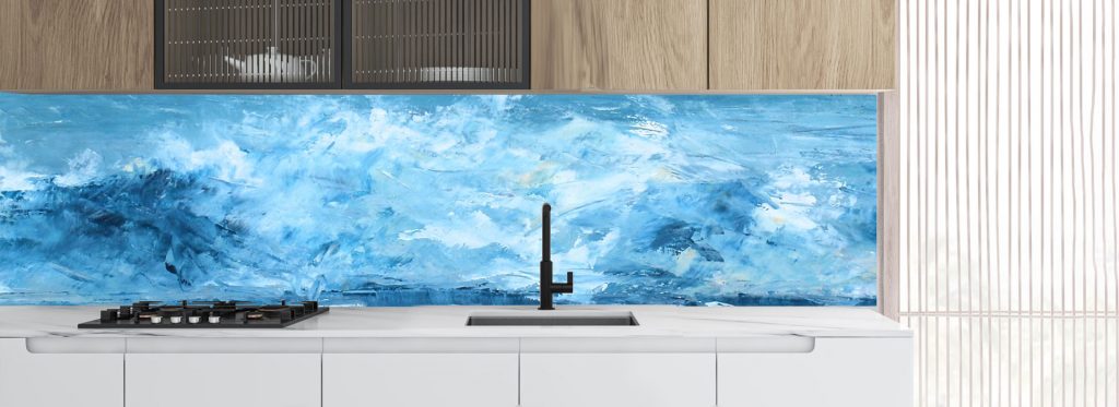 Painted crashing waves splashback in a minimalist white and wood kitchen. 